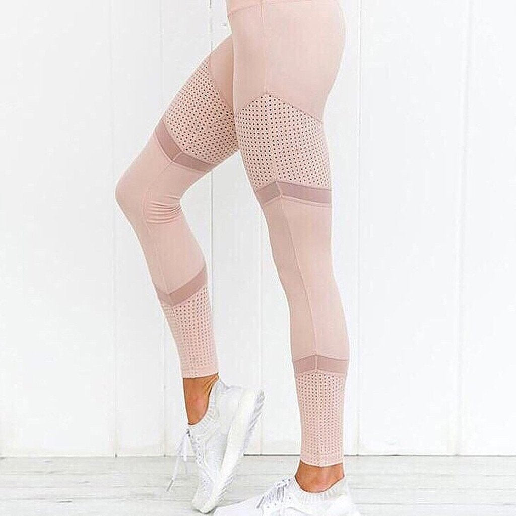 Czarne damskie legginsy sportowe z wysokim stanem i wstawkami z siateczki, idealne do fitnessu i jogi.
