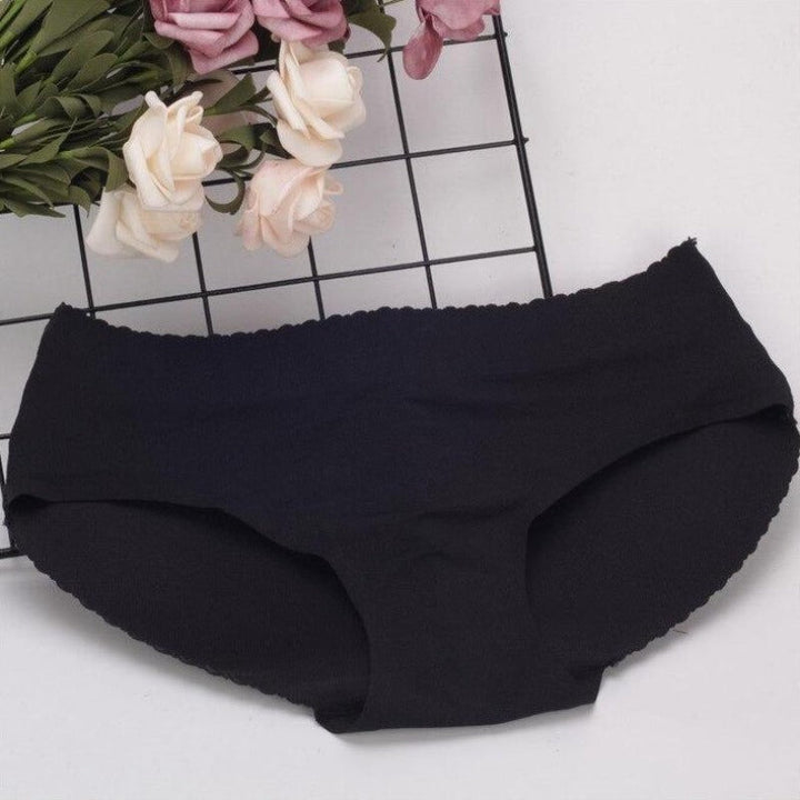 Komfortowe damskie majtki push-up ze średnim stanem, gładki materiał, bielizna modelująca.
