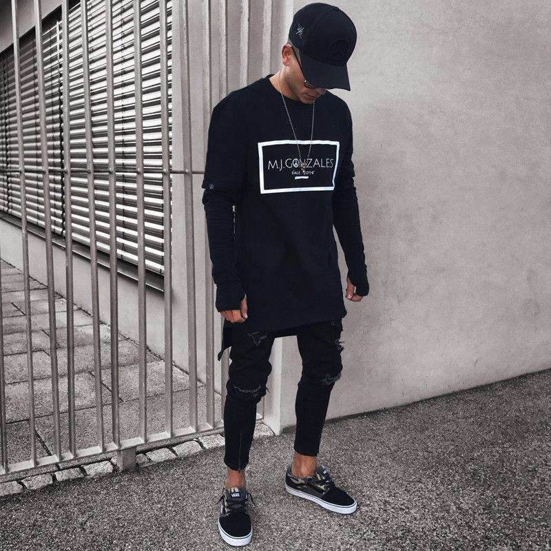 Męskie spodnie jeansowe slim fit ze średnim stanem, czarne, z przetarciami, wygodne, na co dzień.