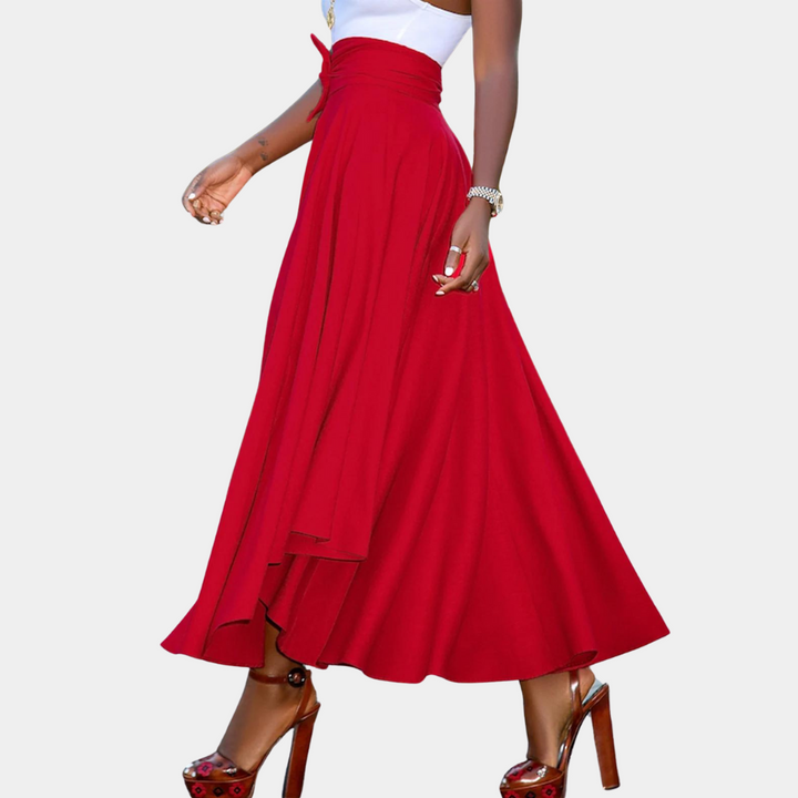 Elegancka czerwona spódnica maxi z wysoką talią, rozkloszowana. Doskonała na wiosenno-letnie stylizacje.