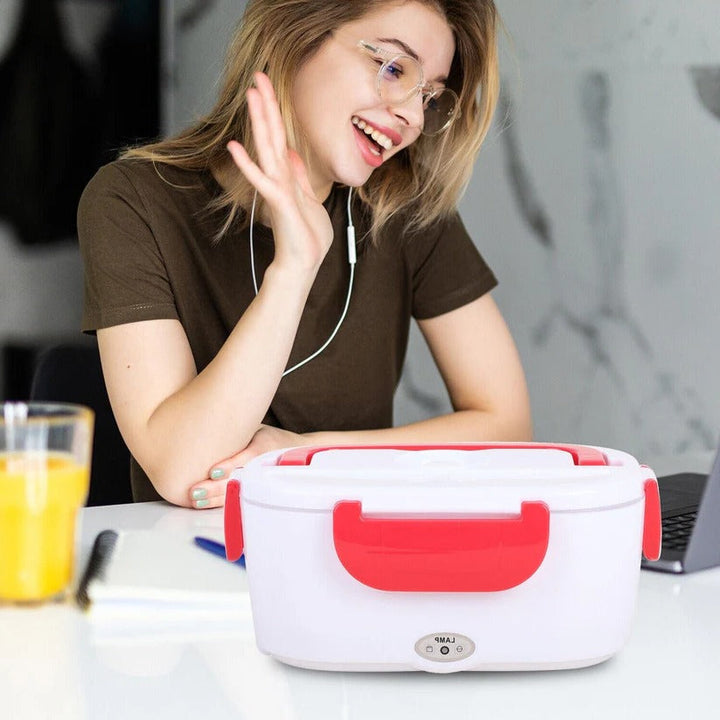 Praktyczny podgrzewany lunchbox unisex, idealny na ciepłe obiady w biurze lub poza domem. Łatwy transport.