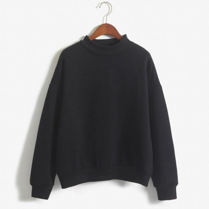 Modna damska bluza nierozpinana oversize, gładka, w stylu streetwear, doskonała do codziennych stylizacji.