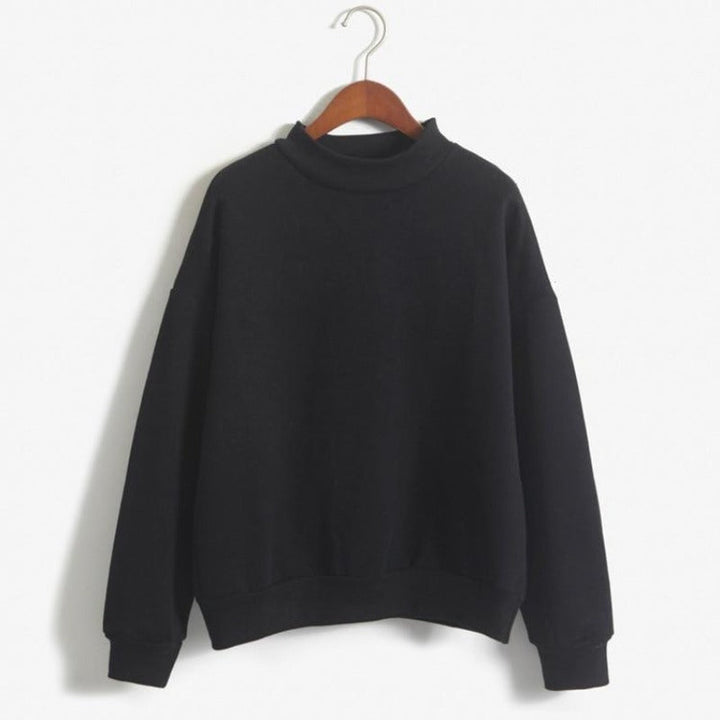 Modna damska bluza nierozpinana oversize, gładka, w stylu streetwear, doskonała do codziennych stylizacji.