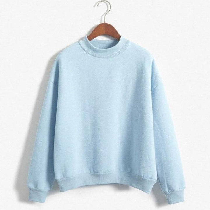 Uniwersalna damska bluza basic oversize, jednokolorowa, idealna na każdą porę roku, zapewnia wygodę.