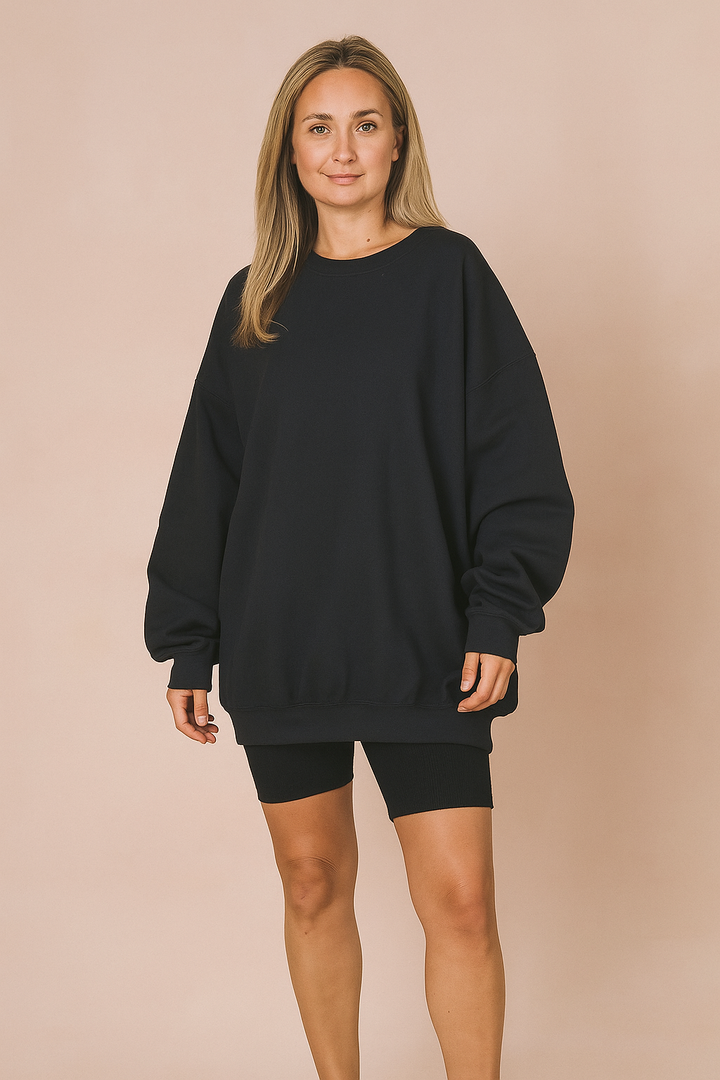 Modna damska bluza oversize, idealna do casualowych stylizacji. Uniwersalna i wygodna na co dzień.