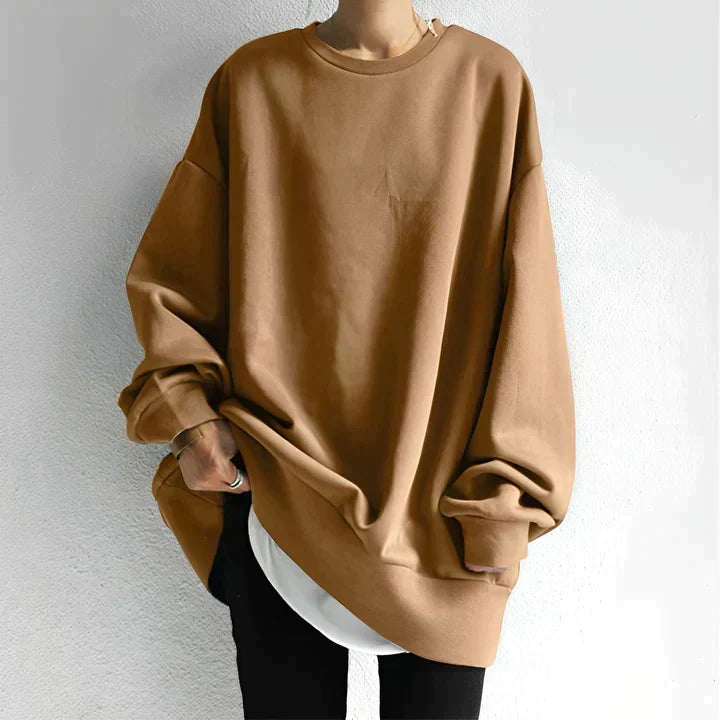 Modna damska bluza oversize w jednolitym kolorze. Miękka i wygodna, do wielu casualowych stylizacji.