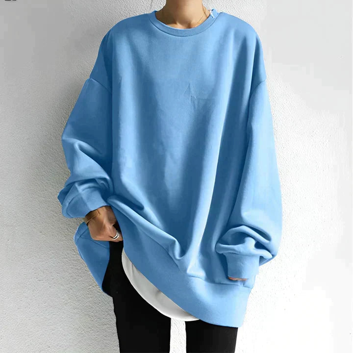 Luźna damska bluza oversize, komfortowy krój na co dzień. Doskonała odzież damska w miejskim stylu.