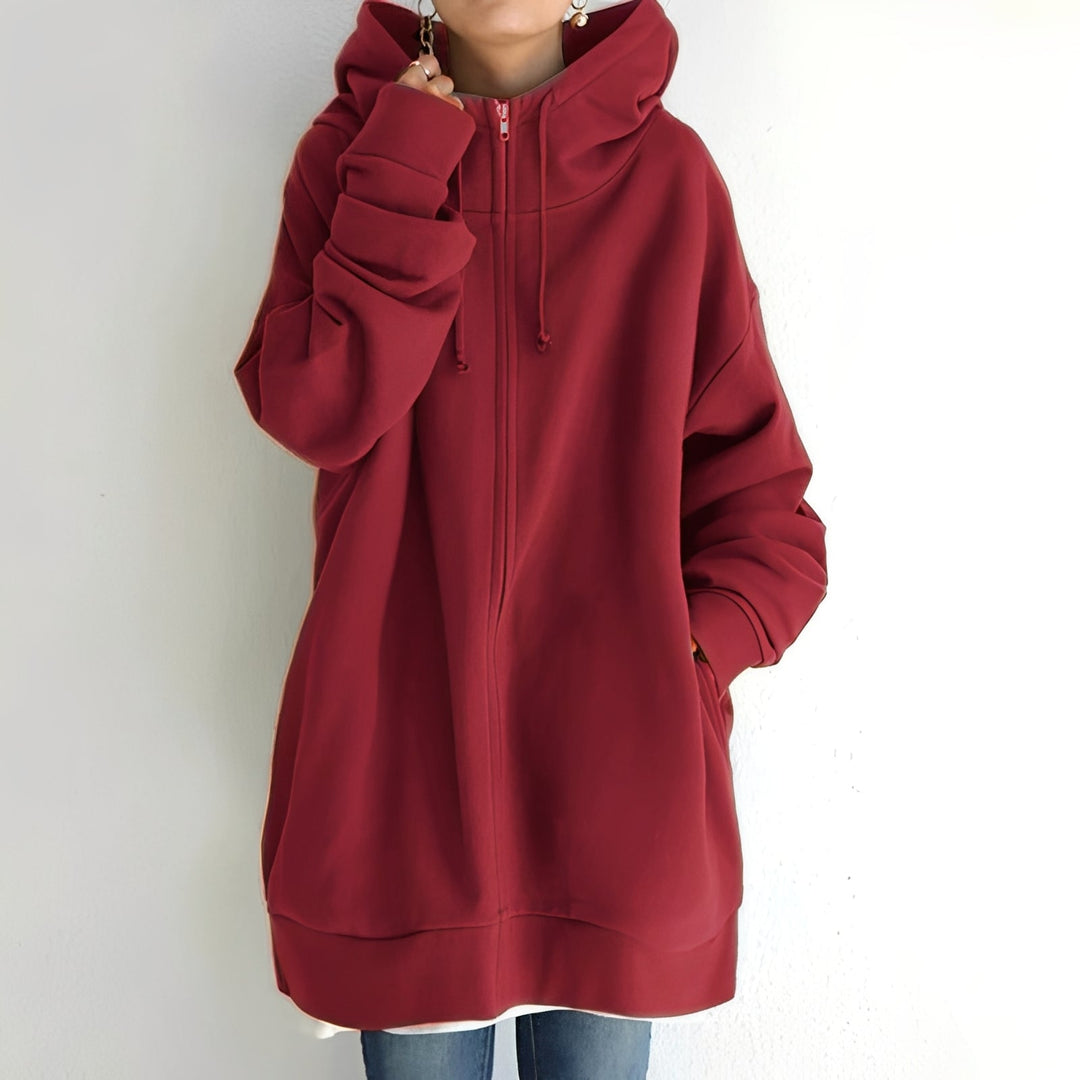 Modna bluza damska oversize z kapturem, idealna do casualowych stylizacji.