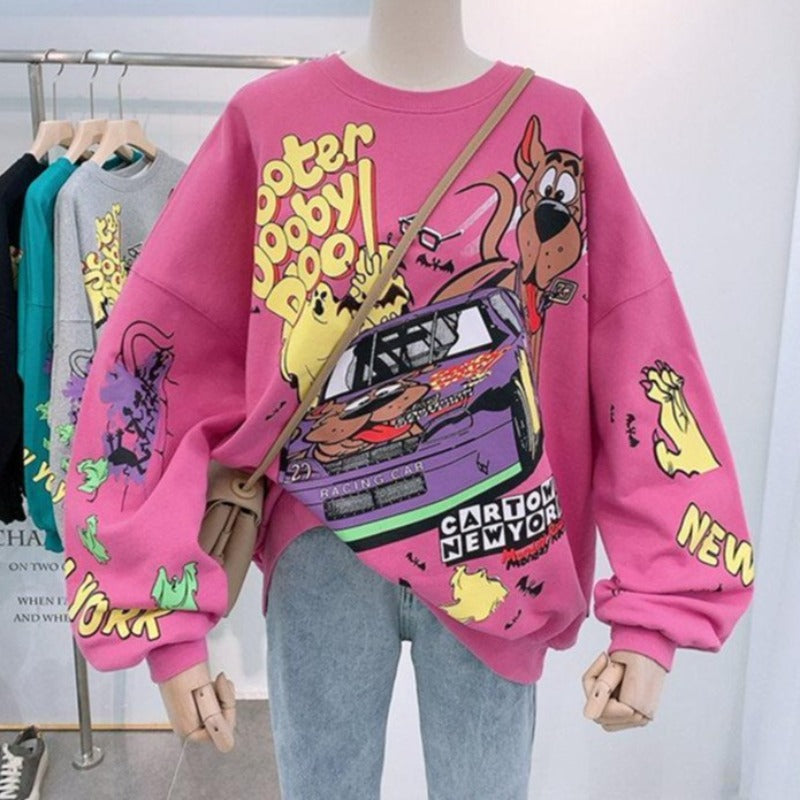 Wygodna damska bluza nierozpinana z nadrukiem kreskówkowym. Oversize, idealna do casualowych stylizacji na każdy dzień.