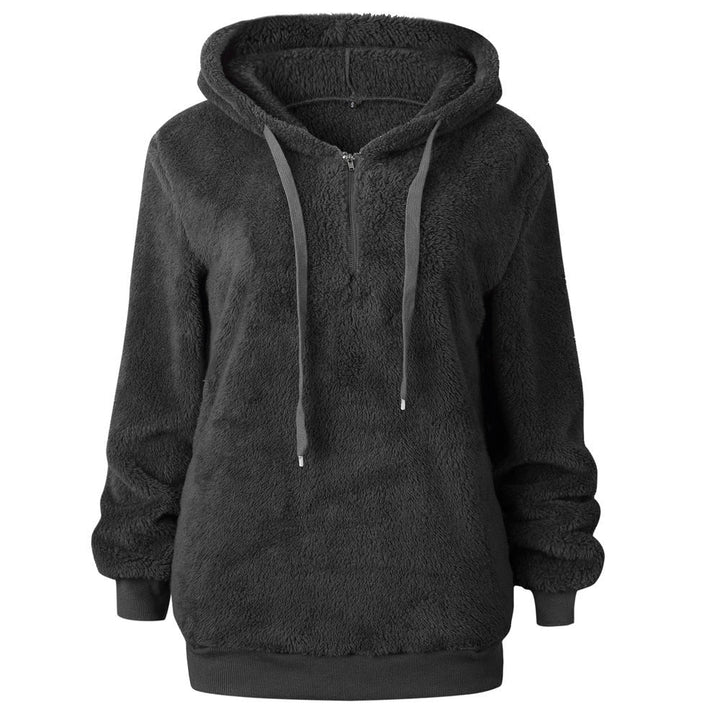 Damska bluza polarowa oversize z kapturem i suwakiem, idealna na chłodne dni, zapewniająca ciepło.