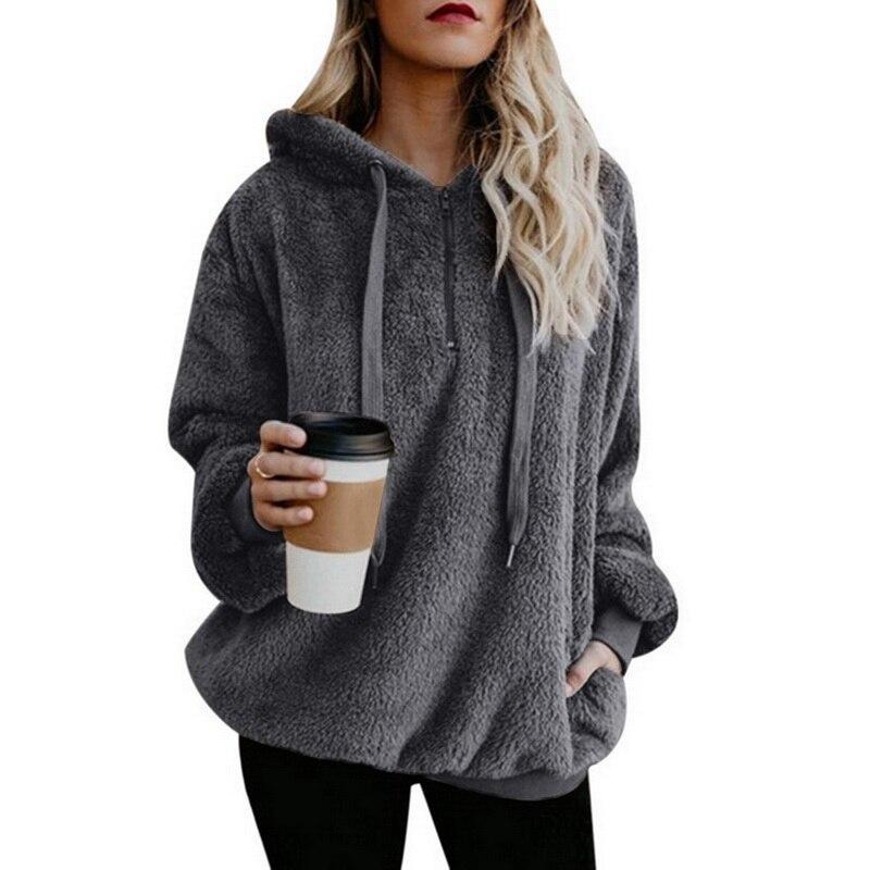 Modna damska bluza polarowa oversize z kapturem i suwakiem, casualowa stylizacja, maksymalny komfort.