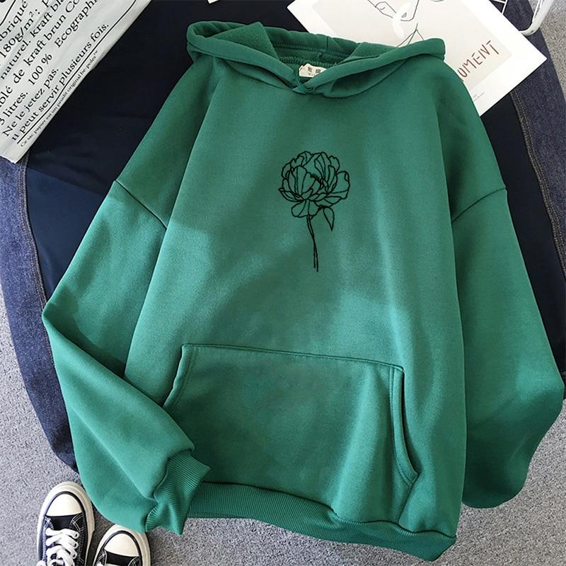 Komfortowa damska bluza z kapturem i eleganckim kwiatowym wzorem, doskonała na co dzień i streetwear.