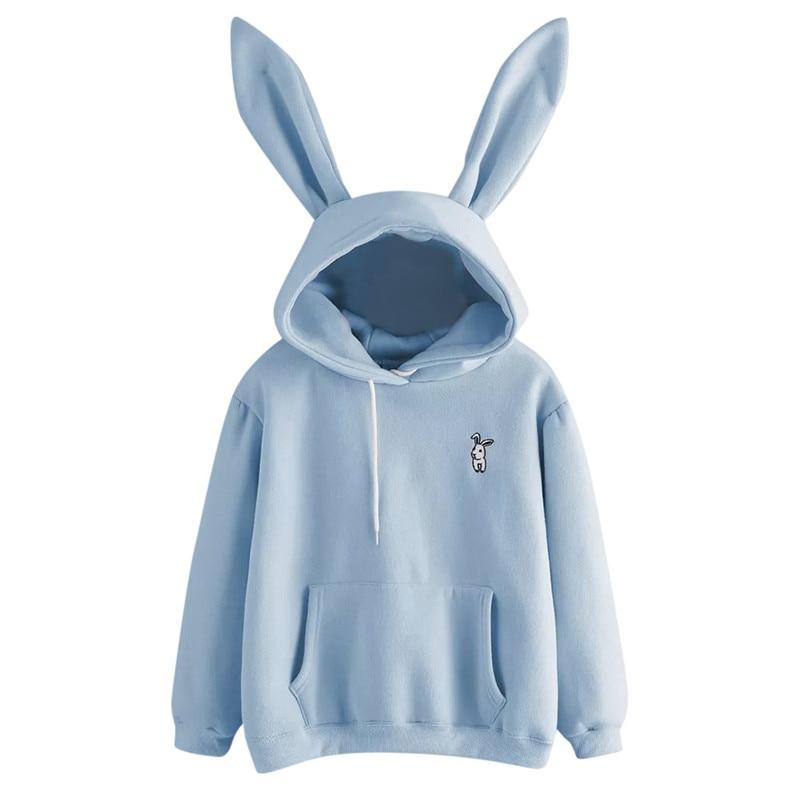Damska bluza z kapturem w pastelowym kolorze, z uroczymi króliczymi uszami. Idealna do jesiennych, casualowych stylizacji.