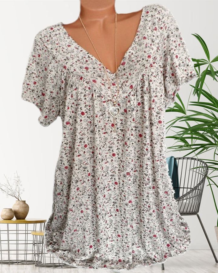Letnia bluzka damska z nadrukiem, dekolt V, krótki rękaw. Styl boho, casualowa, modna.