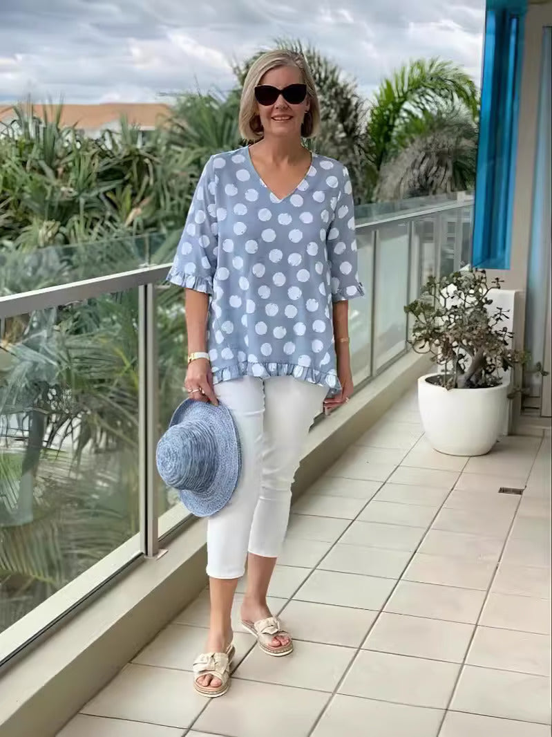 Damska bluzka z dekoltem V i falbanami. Elegancki i modny top na co dzień, idealny do letnich stylizacji.