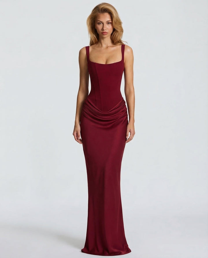 Damska sukienka wieczorowa, maxi, dopasowana, elegancja i komfort. Modny krój klepsydry.