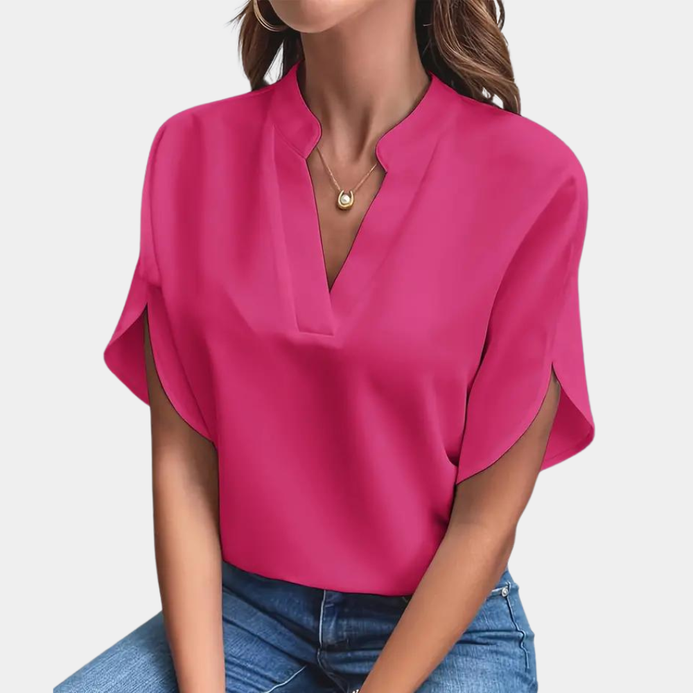 Damska bluzka wiosenna z dekoltem w serek, krótki rękaw. Idealna do eleganckich i codziennych outfitów.