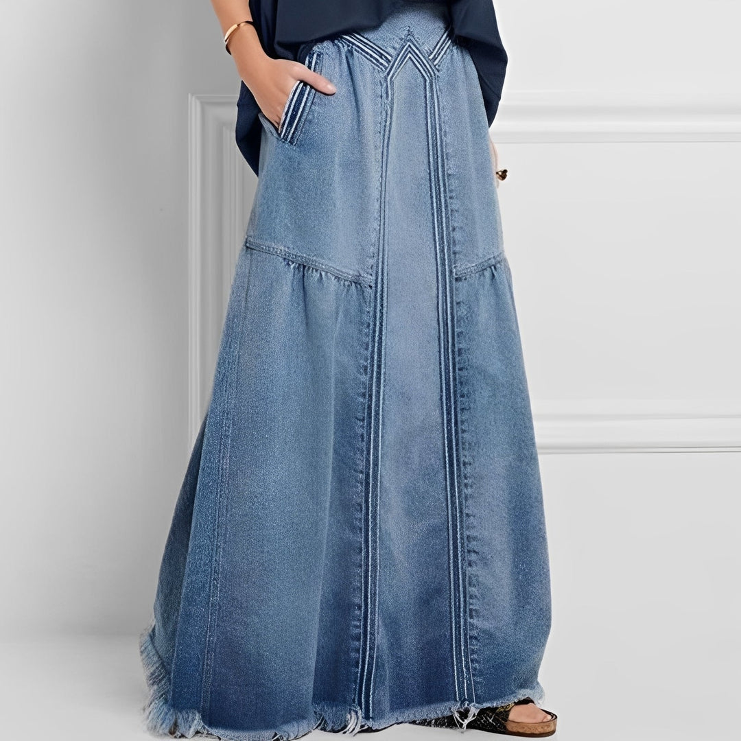 Damska jeansowa spódnica Nella z elastyczną talią i kieszeniami, idealna na lato. Wygodna, casualowa moda vintage.
