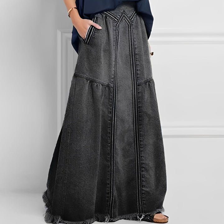 Spódnica damska Nella, jeansowa, casualowa. Z elastyczną talią, kieszeniami, idealna na lato. Styl vintage.
