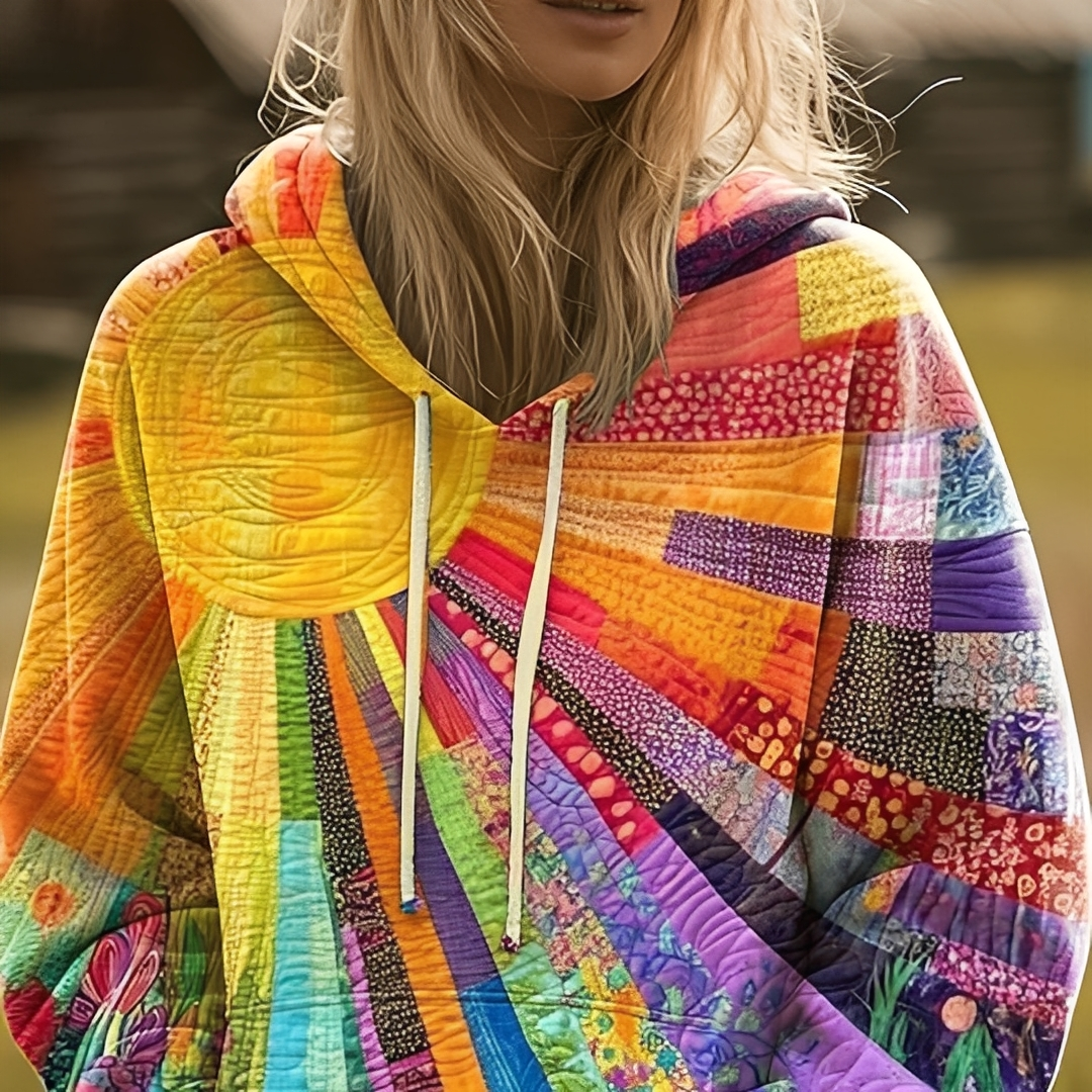 Damska kolorowa bluza z kapturem, luźna, z modnym wzorem patchwork i słońca. Idealna na jesień i zimę.