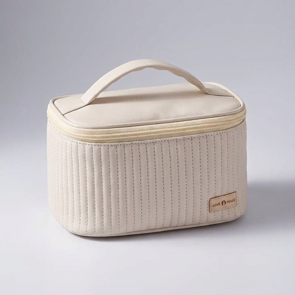 Elegancka damska kosmetyczka podróżna NeatCase z pikowaniem, funkcjonalna torba-organizer na kosmetyki do makijażu.