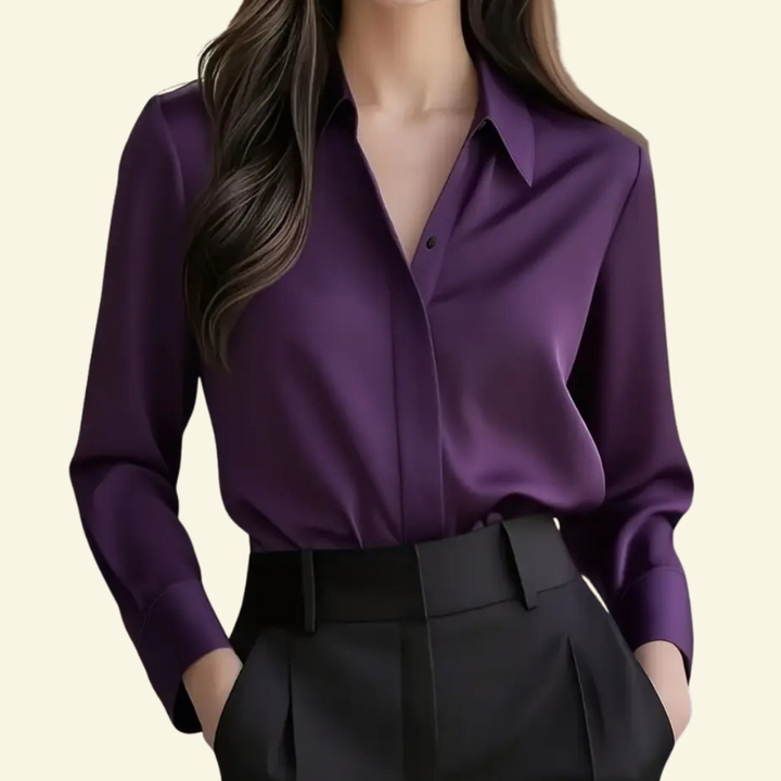 Uniwersalna damska koszula z długim rękawem. Elegancki czysty design, świetna do biura i na casual.