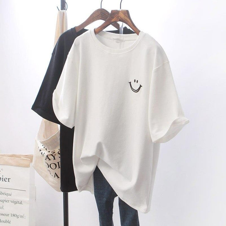 Damska koszulka oversize z uśmiechniętym nadrukiem buźki. Luźny, komfortowy t-shirt idealny na co dzień.