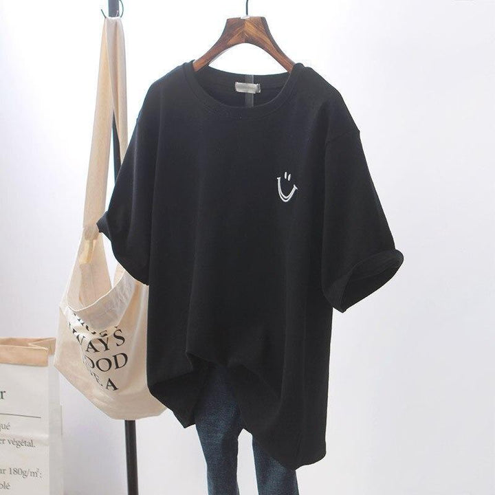 Czarna koszulka damska oversize, stylowy t-shirt z modnym nadrukiem uśmiechniętej buźki. Luźny krój.