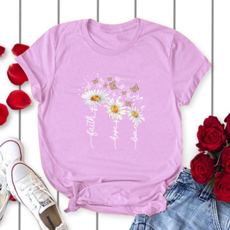 Damski T-shirt z delikatnym, kolorowym kwiatowym nadrukiem. Wiosenna moda damska w najlepszym wydaniu. Komfortowa.