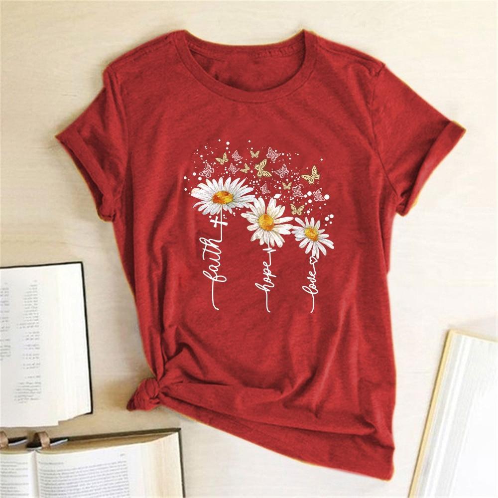 Wygodna letnia koszulka damska T-shirt z eleganckim kwiatowym wzorem. Doskonała na casualowe i wiosenne stylizacje.