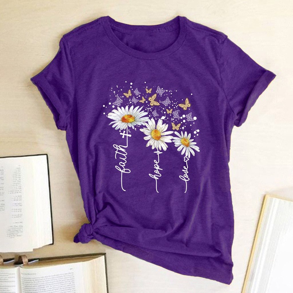 Damska koszulka T-shirt z okrągłym dekoltem. Kwiatowy nadruk w intensywnych barwach podkreśla letni styl i elegancję.