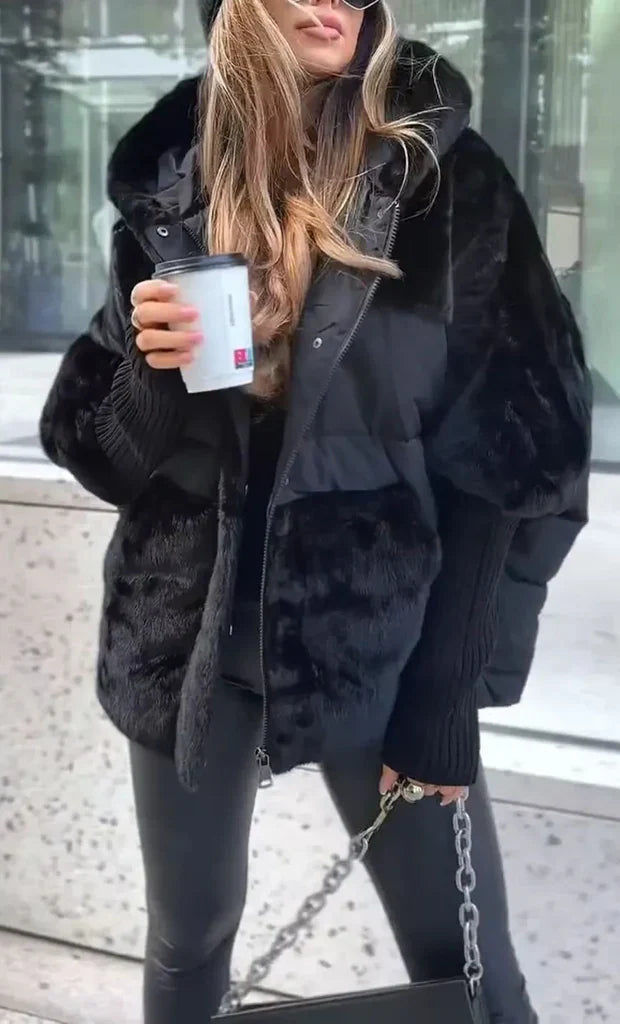 Elegancka kurtka zimowa damska oversize, idealna do miejskiego stylu. Modna, z kapturem, na każdą zimową okazję.