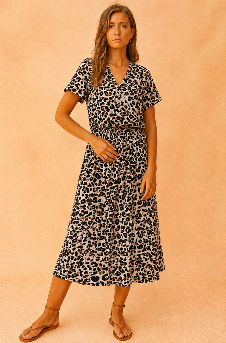 Elegancka letnia sukienka midi boho z wiązaniem. Modna i wygodna damska sukienka na lato.