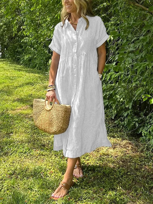 Modna damska sukienka midi w paski, rozszerzana. Doskonała na lato, łączy styl elegancki z casualowym.
