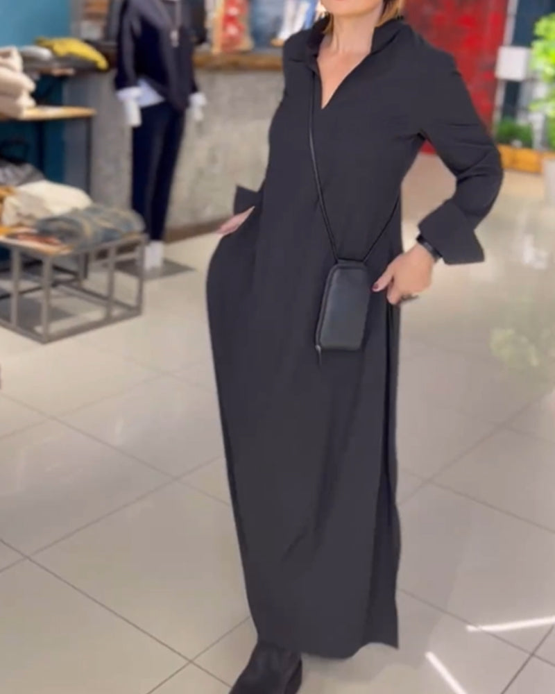 Elegancka damska sukienka maxi z rozcięciem, luźny krój. Idealna na letnie stylizacje i wiosenne dni.
