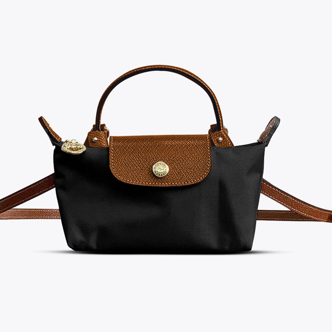 Damska mała torebka crossbody ze skóry z regulowanym paskiem. Idealna na co dzień.