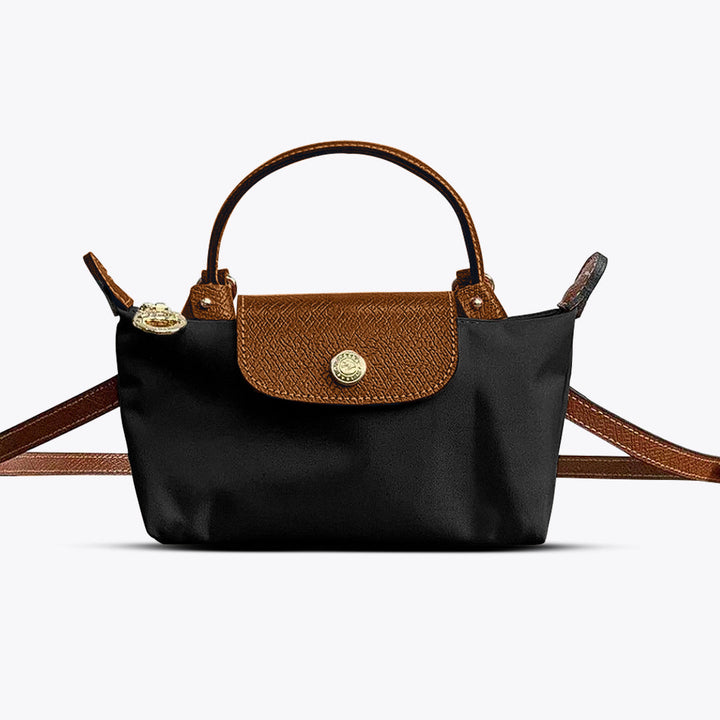 Damska mała torebka crossbody ze skóry z regulowanym paskiem. Idealna na co dzień.