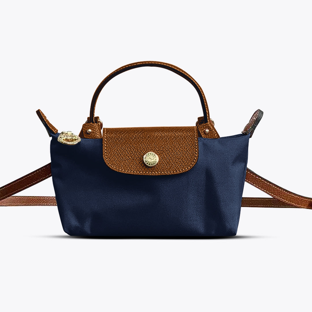Mała, praktyczna torebka crossbody ze skóry dla kobiet. Idealna na niezbędne drobiazgi i wieczorne wyjścia.