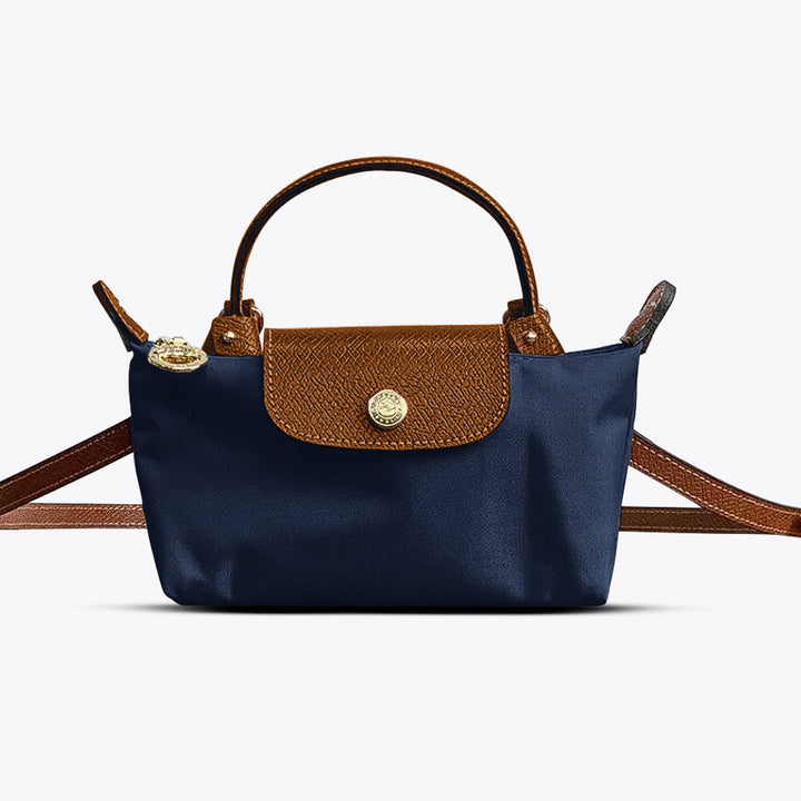 Mała, praktyczna torebka crossbody ze skóry dla kobiet. Idealna na niezbędne drobiazgi i wieczorne wyjścia.