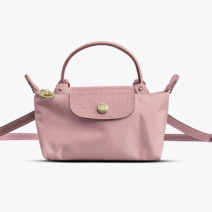Uniwersalna damska torebka crossbody. Skórzana, z paskiem do noszenia na ramieniu lub przez ciało.