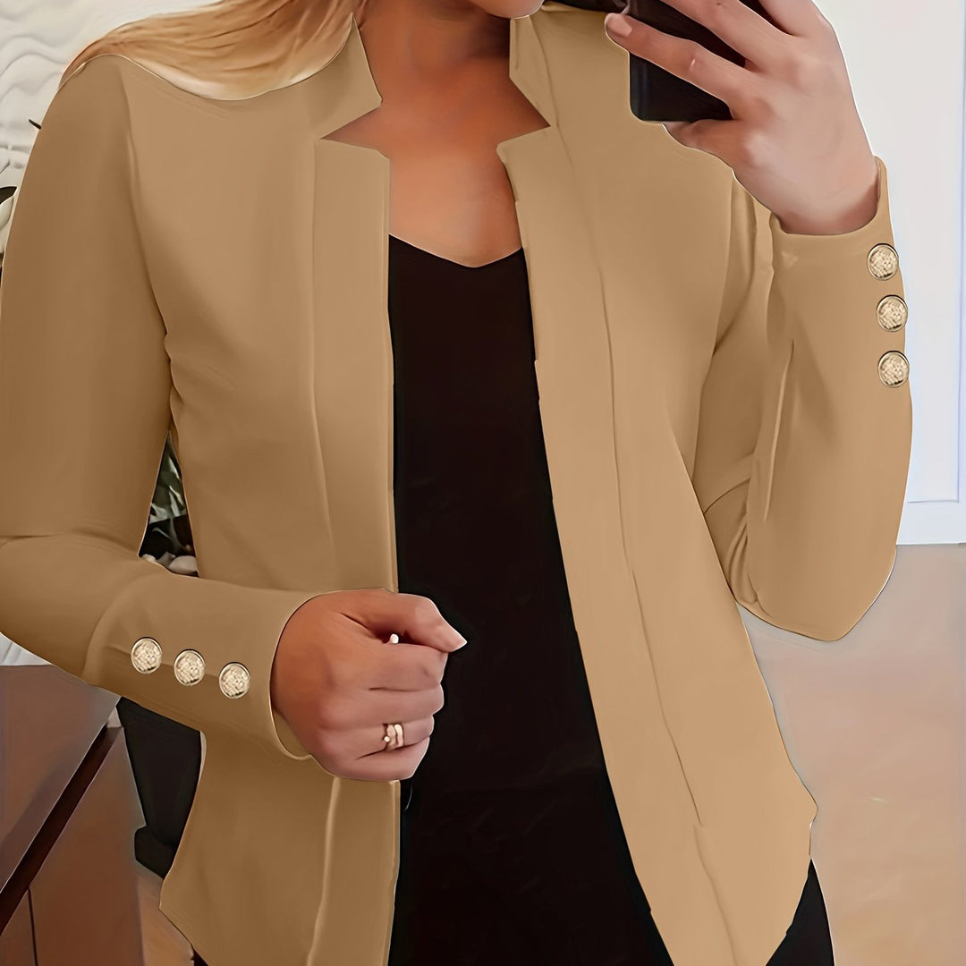 Elegancka marynarka damska, długi rękaw, otwarty przód, na modelce w stylizacji.