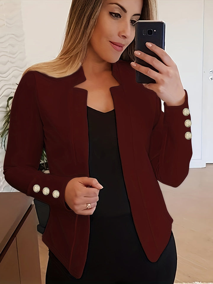 Biała marynarka damska, długi rękaw, otwarty przód, do eleganckich stylizacji.