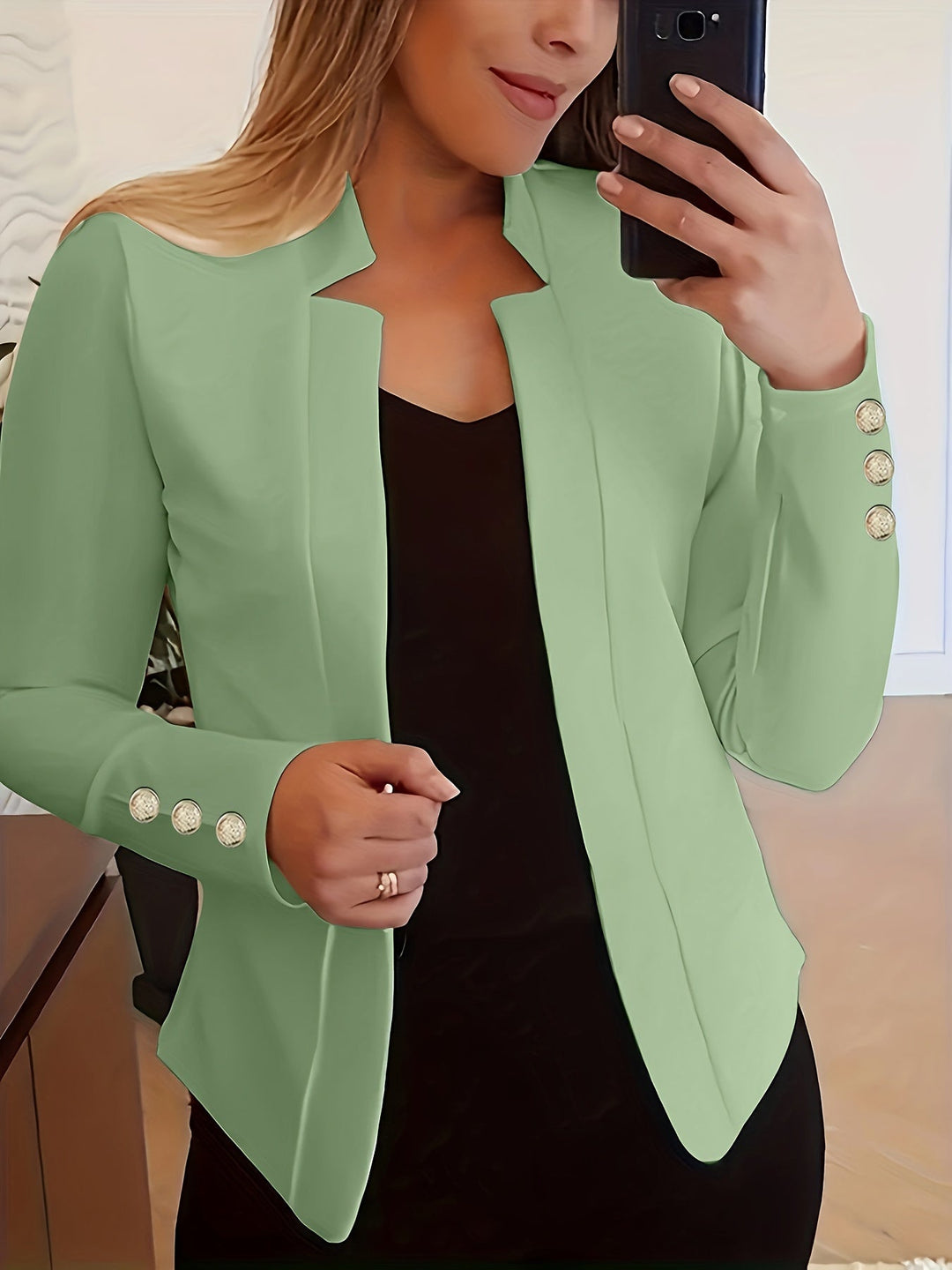 Beżowa marynarka damska, długi rękaw, otwarty przód, idealna do biurowego dress code'u.