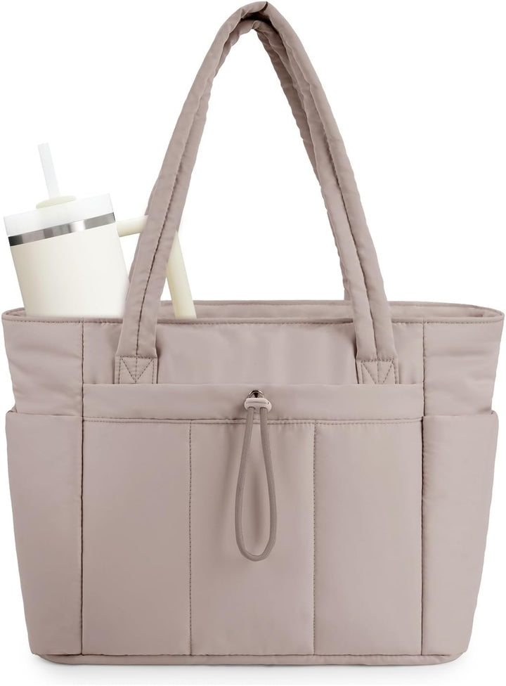 Komfortowa torba na co dzień. Pikowana torebka shopper z miejscem na laptopa i uchwytem na napój.
