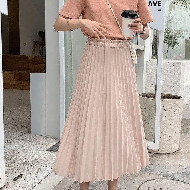 Damska plisowana spódnica midi, rozkloszowana, z elastyczną gumką w pasie. Elegancka i uniwersalna.