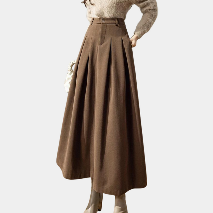 Damska spódnica Elly Elegant. Klasyczna, elegancka spódnica zimowa idealna dla kobiety ceniącej styl i modę.