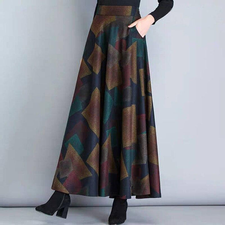 Damska spódnica maxi vintage, rozkloszowana, z kwiecistym wzorem, idealna na lato.