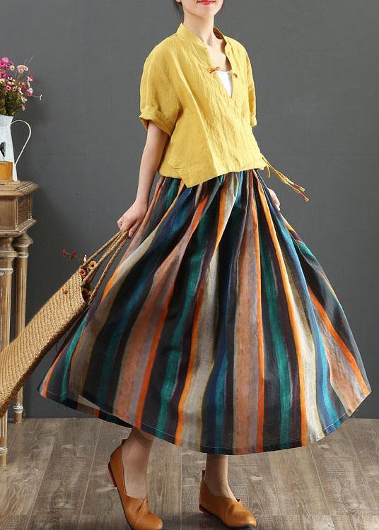 Stylowa spódnica damska midi w paski, rozkloszowana, z wysokim stanem retro. Modny casual.