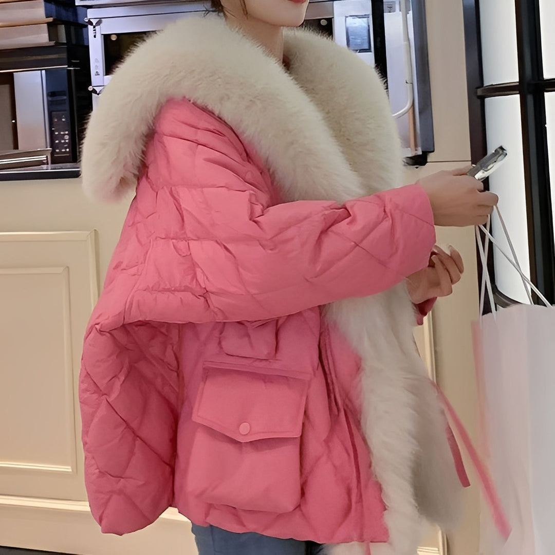 Modna damska luźna kurtka zimowa oversize z kołnierzem. Eleganckie i ciepłe okrycie wierzchnie.