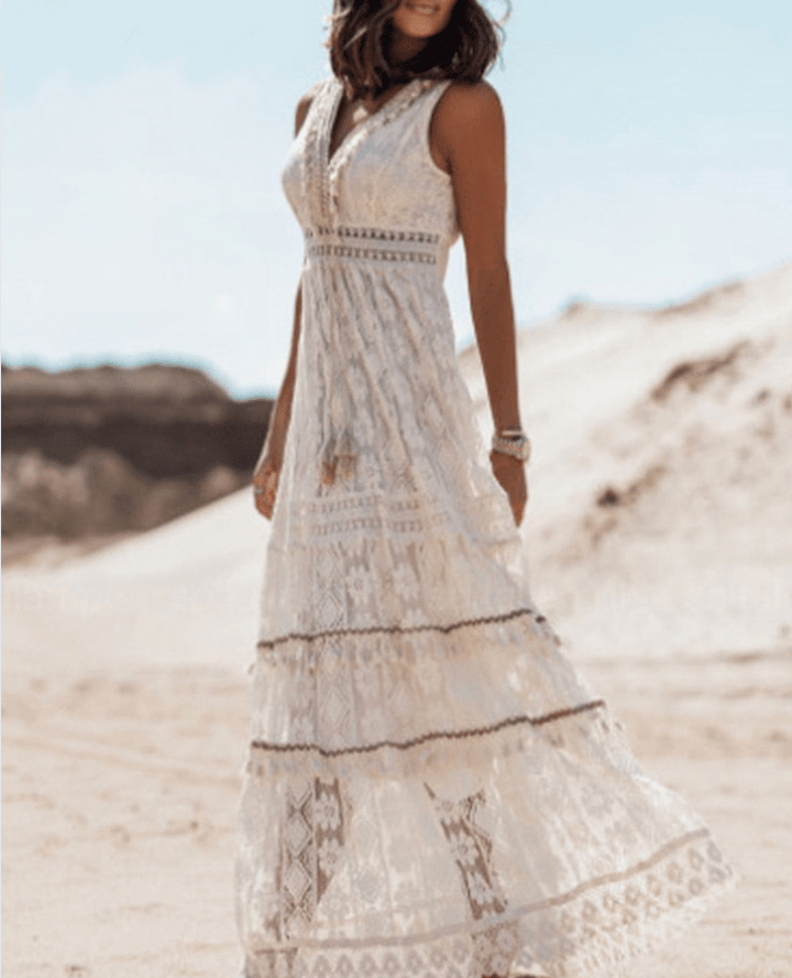Elegancka damska sukienka maxi boho na specjalne okazje. Lekki materiał, idealna na wieczorne wyjścia.
